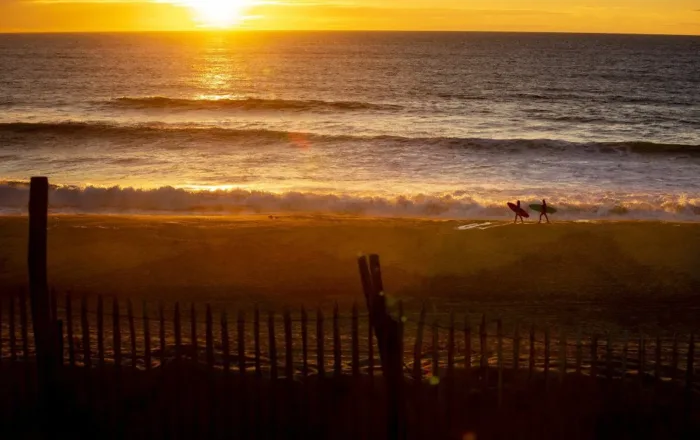 Surfing in Vieux-Boucau at dusk
